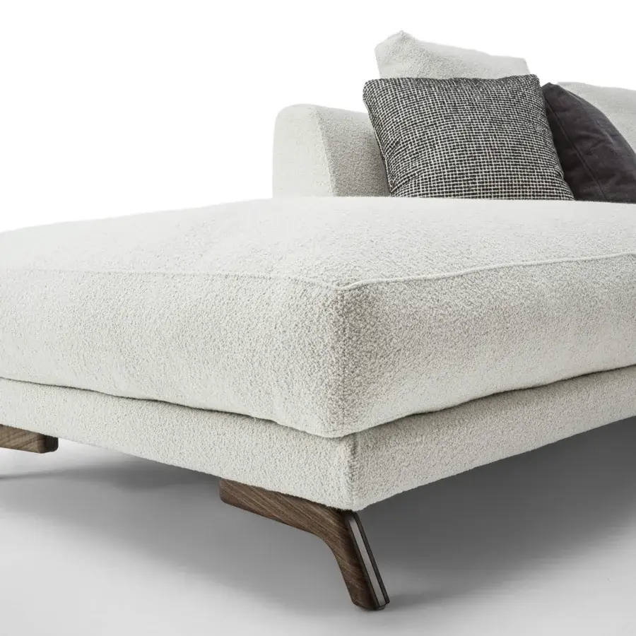 Distinguished Porada Étienne sofa with soft off-white Microflock upholstery and pewter grey metal feet built with wooden inserts