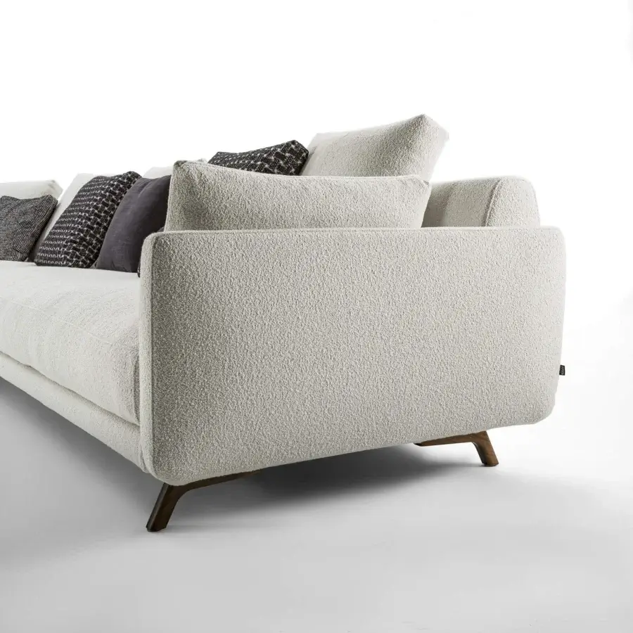 Exceptional Porada Étienne sofa with creamy textured Microflock upholstery and pewter grey metal feet built with wooden inserts