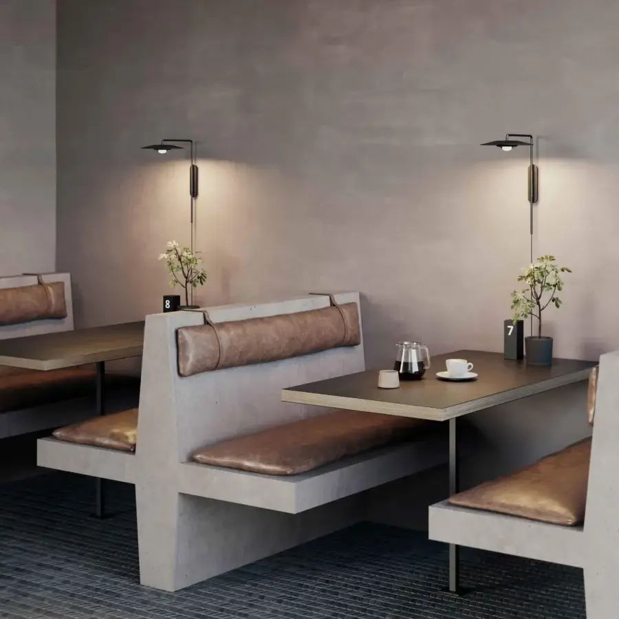 Distinguished Luceplan Koinè wall lamp crafted in aluminum with a refined matte finish and a dark geometric silhouette