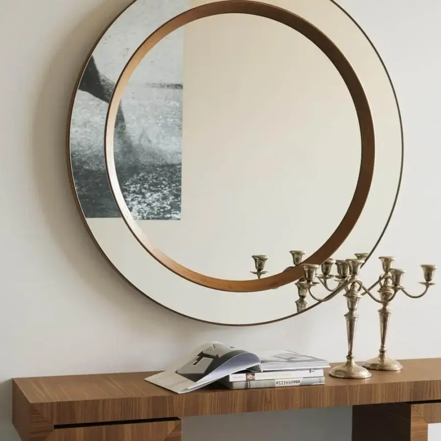 Distinguished Porada Miss Tondo mirror with round form crafted in canaletto walnut and clear reflective glass with natural finish