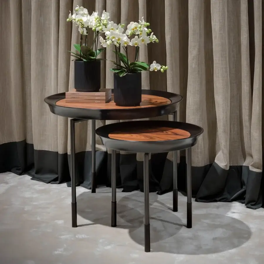 Elegant Giorgetti Athene side table with sculpted form, polished maple, and radiant Pau Ferro insert with glazed bronzed metal legs