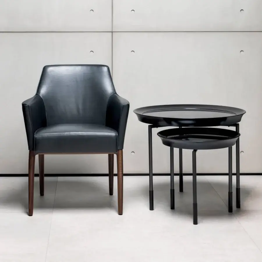 Elegant Giorgetti Athene side table with sculpted circular form, polished maple and radiant Pau Ferro insert in glazed bronzed metal