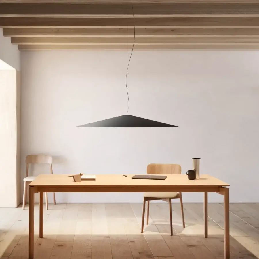 Distinguished Luceplan Koinè suspension lamp with broadly conical form in matte black aluminum and engineered mineral glass lens