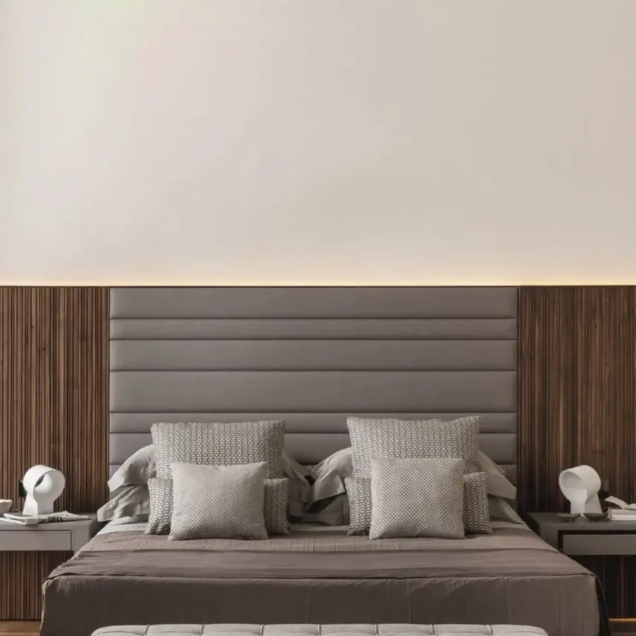 Exceptional Porada Boheme & Morfeo bed crafted with solid canaletto walnut and refined gray upholstery exhibiting horizontal stitching and vertical grooves