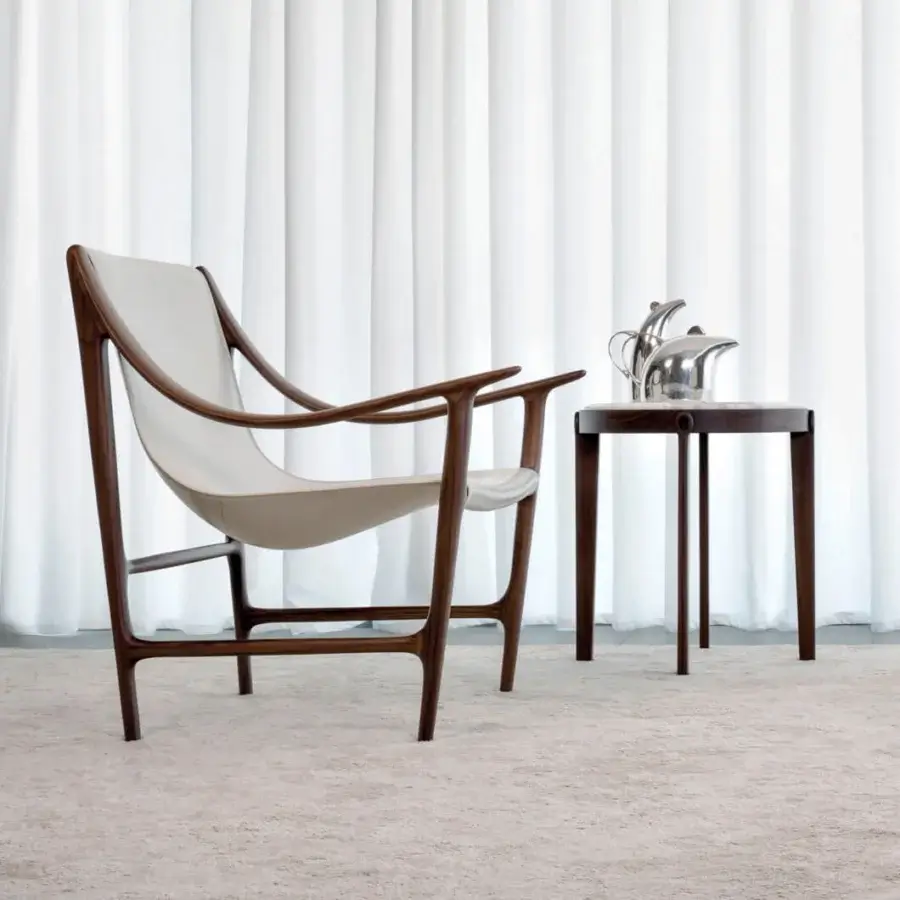 Distinguished Giorgetti Ago side table crafted in Canaletto walnut with satin finish and medium-dark brown hue