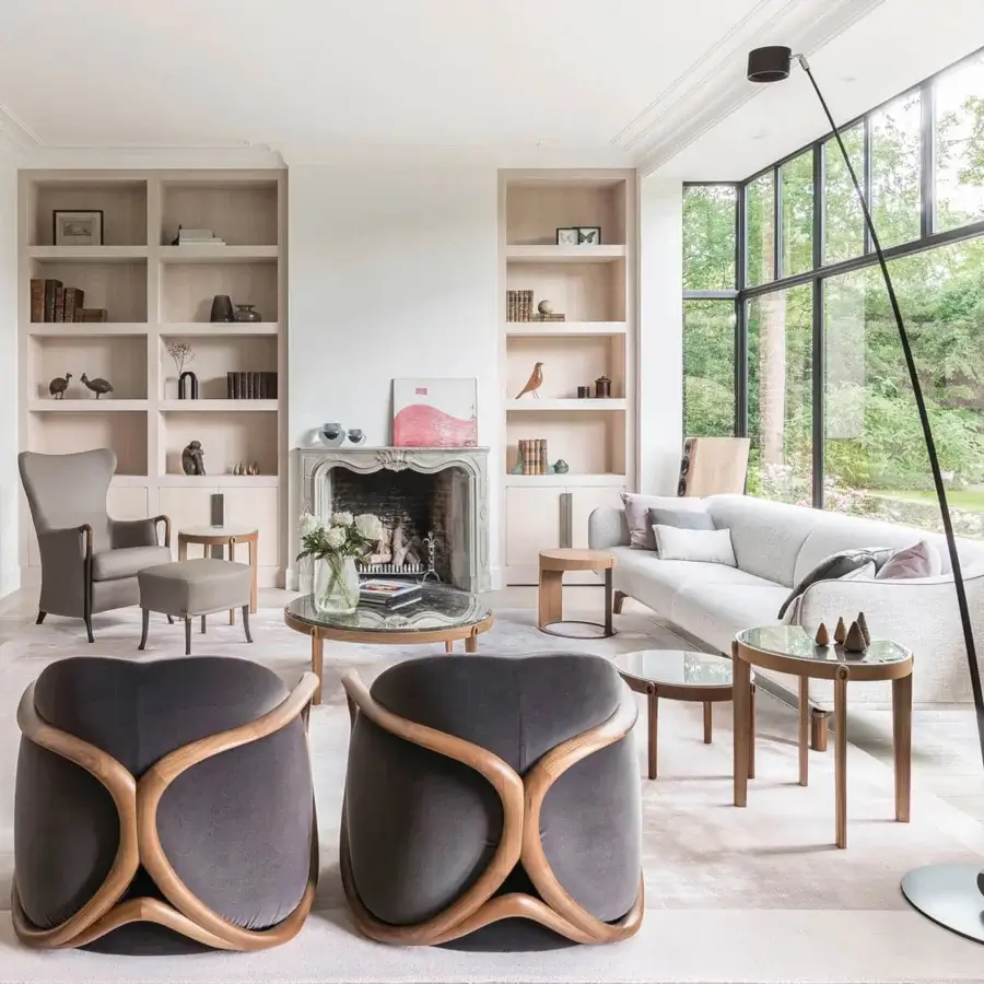 Superior Giorgetti Ago side table in solid Canaletto walnut with a graceful curved frame and satin finish