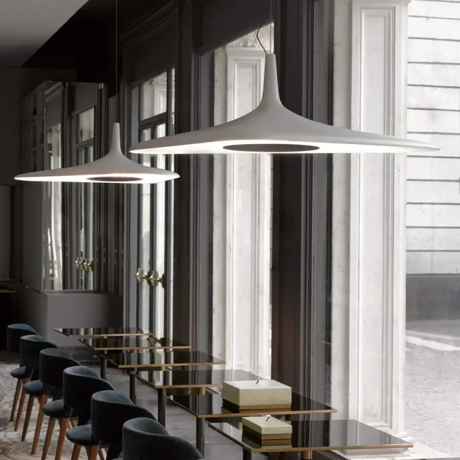 Innovative Luceplan Soleil Noir suspension lamp sculpted from expanded polyurethane with matte black finish