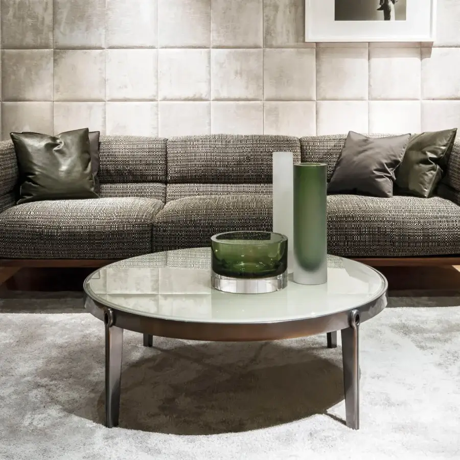 Exceptional Giorgetti Ago coffee table with sleek clear glass top and polished metallic interconnected base
