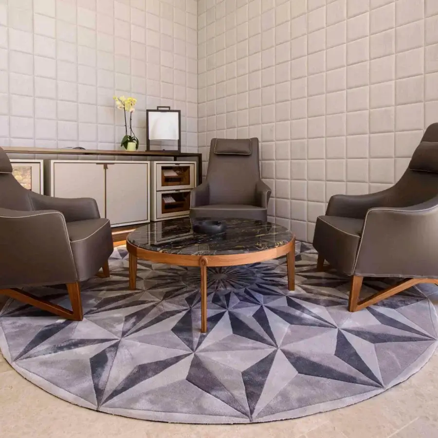 Superior Giorgetti Ago coffee table with a marble top and Canaletto walnut base in a satin finish