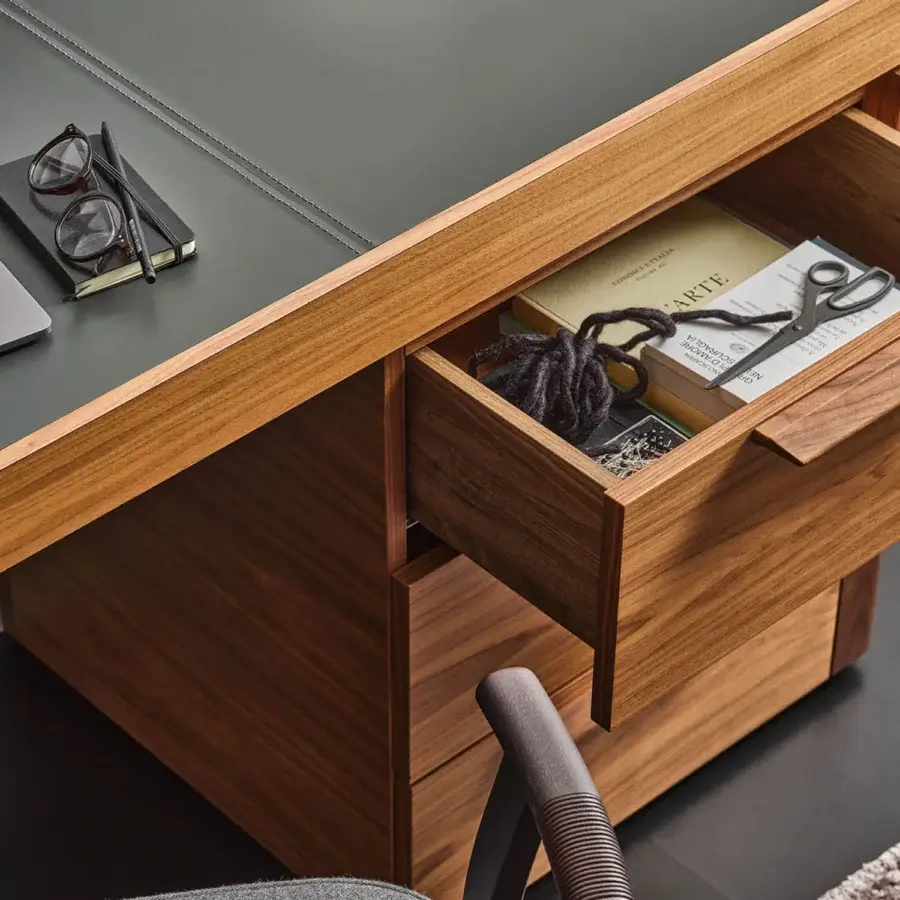 Elegant Porada Afordite desk crafted with solid Canaletta walnut exhibiting a natural finish and satin sheen alongside a three-drawer module