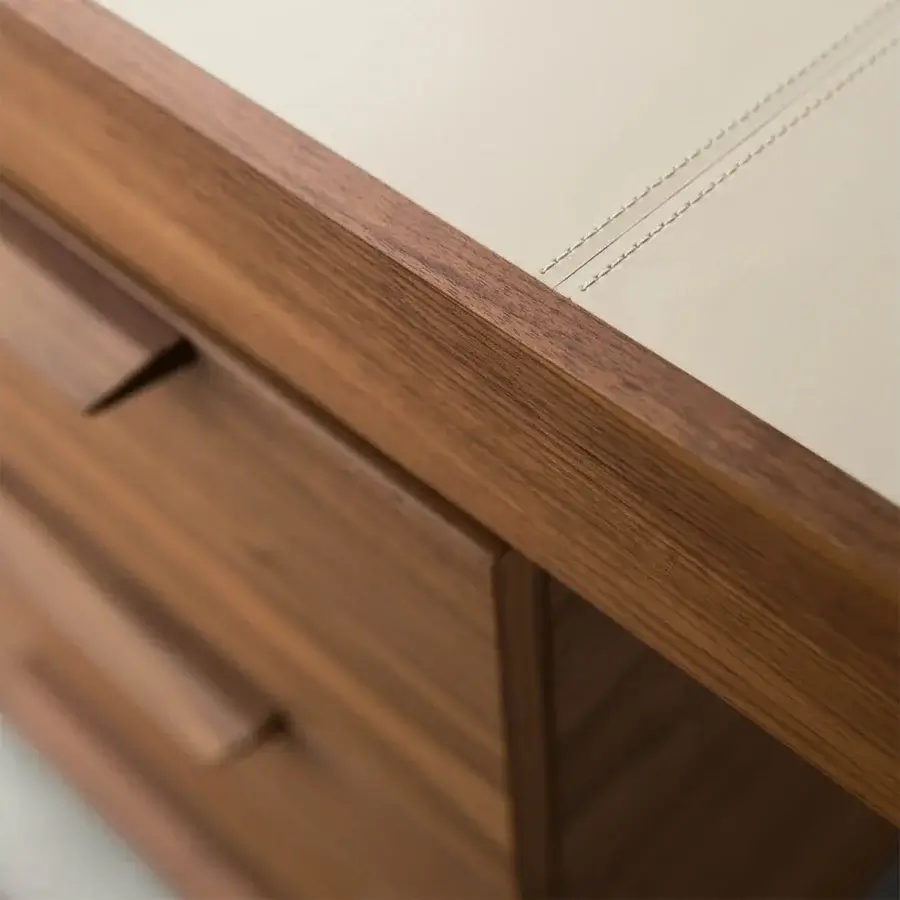 Distinguished Porada Afordite desk built in solid Canaletta walnut with a satin finish and customized three-drawer module