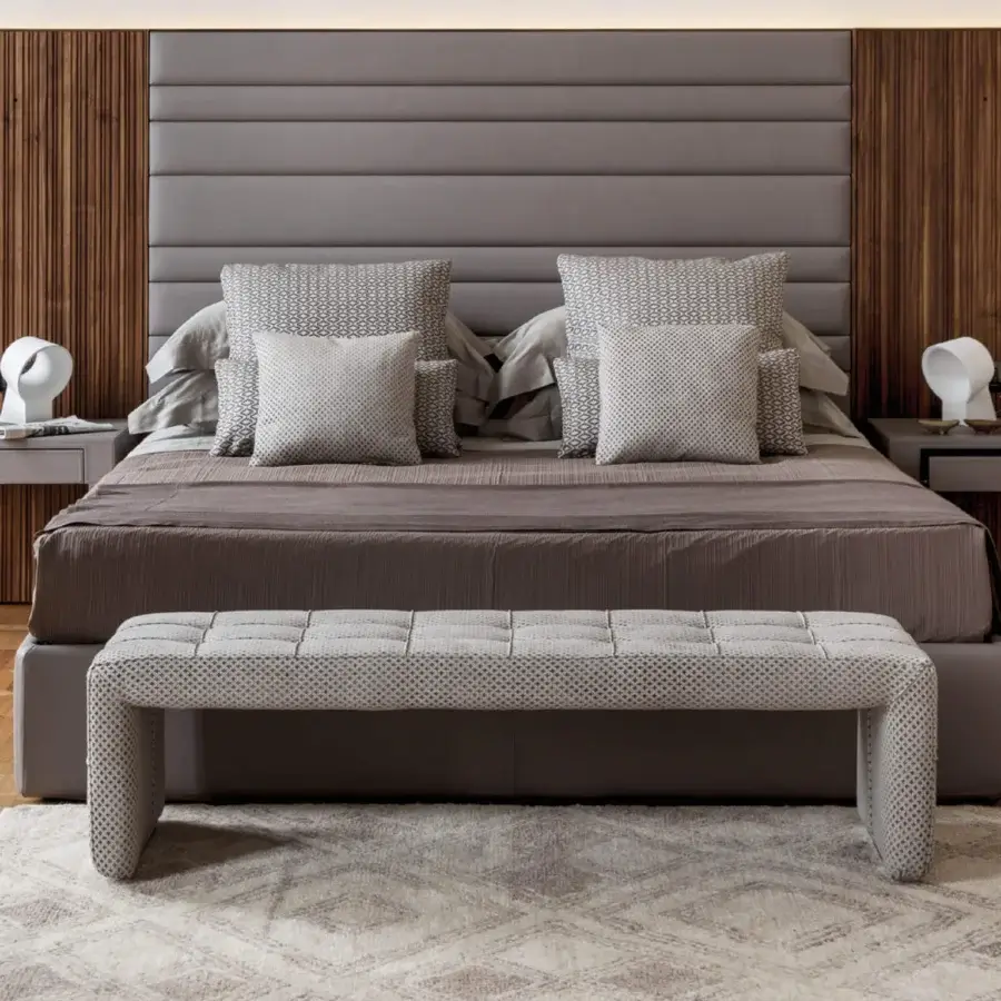 Distinguished Porada Boheme & Morfeo bed with canaletto walnut and plush muted gray upholstery exhibiting horizontal stitching details