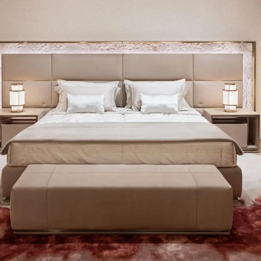 Exceptional Visionnaire Aubade bench with smooth beige fabric upholstery and elegant satin metal detailing along the base