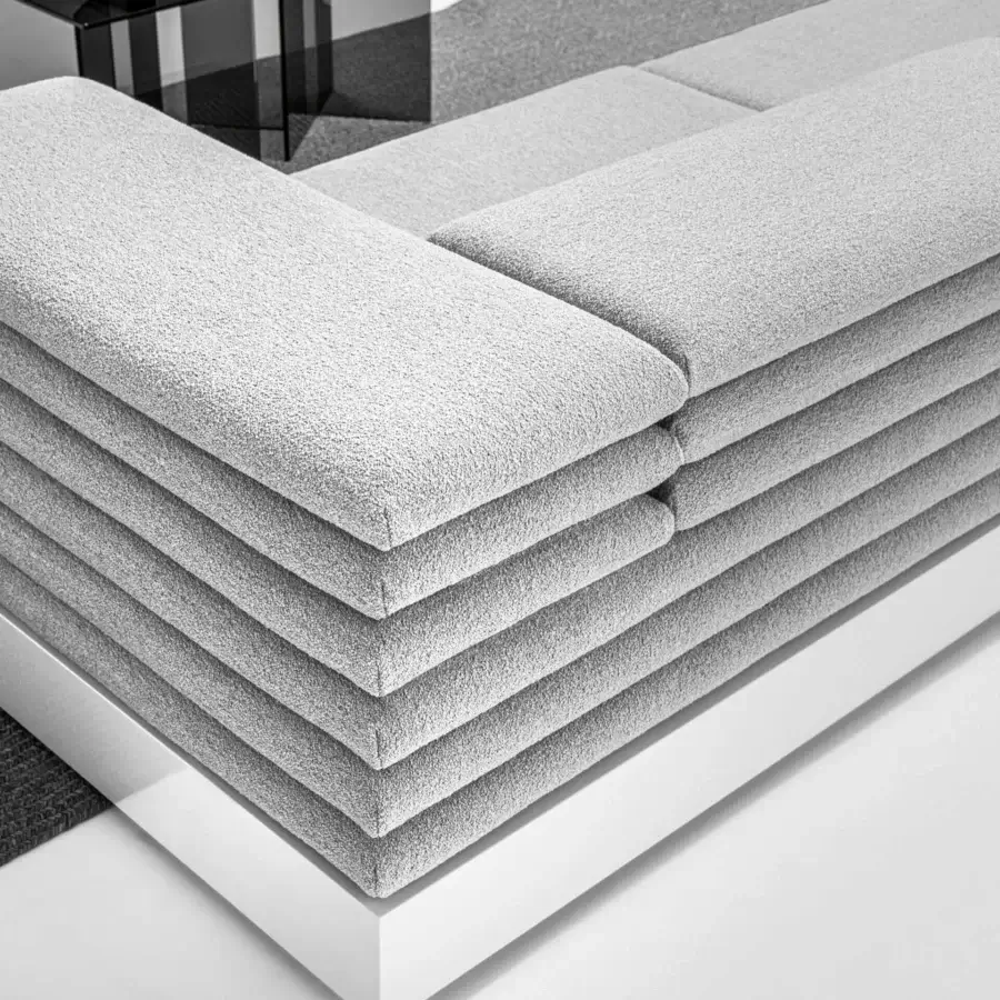 Elegant LaCividina Acamante modular sofa crafted in light gray textured textile with overlapping cushions and a lined base