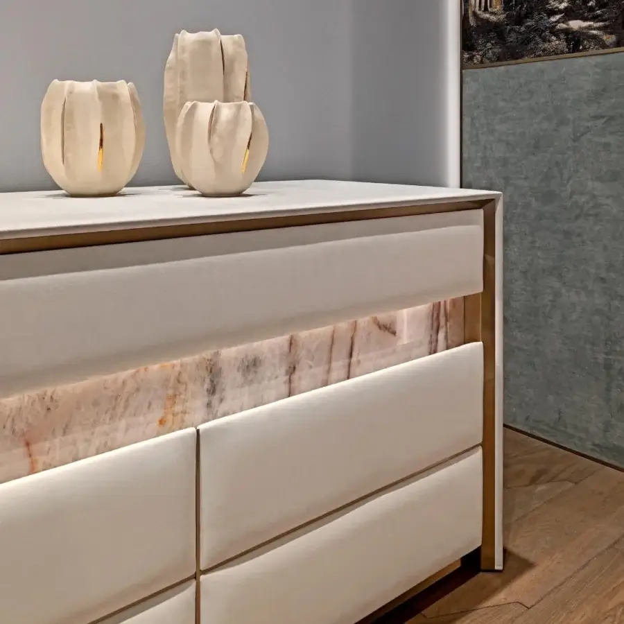 Lavish Visionnaire Aubade sideboard with light beige leather upholstery, quilted drawers and integrated marble accents