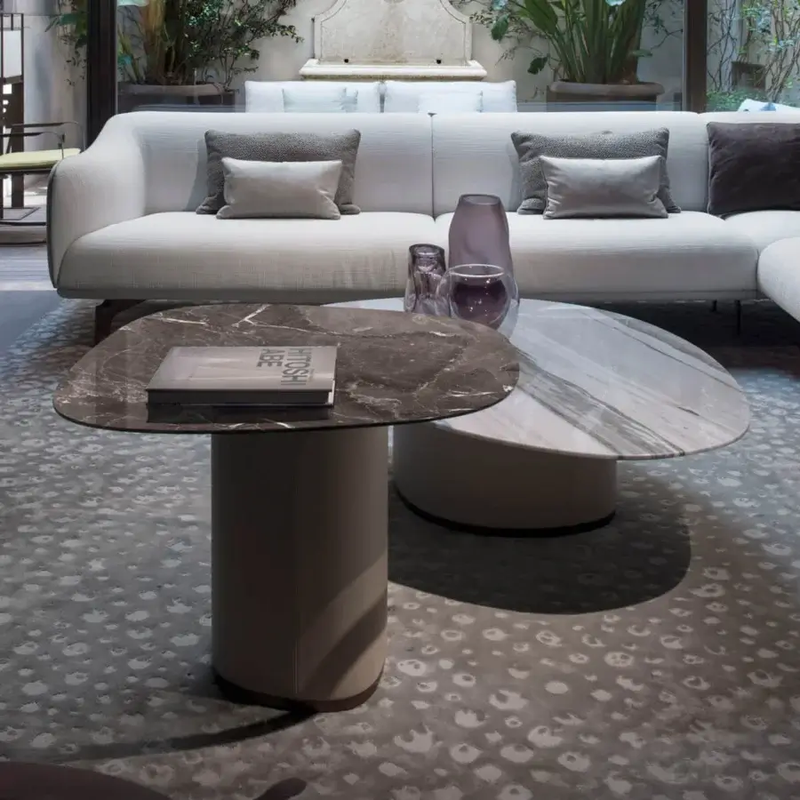 Superior Giorgetti Galet coffee table with dark gray marble top and matte taupe leather-wrapped cylindrical base crafted with polished finish