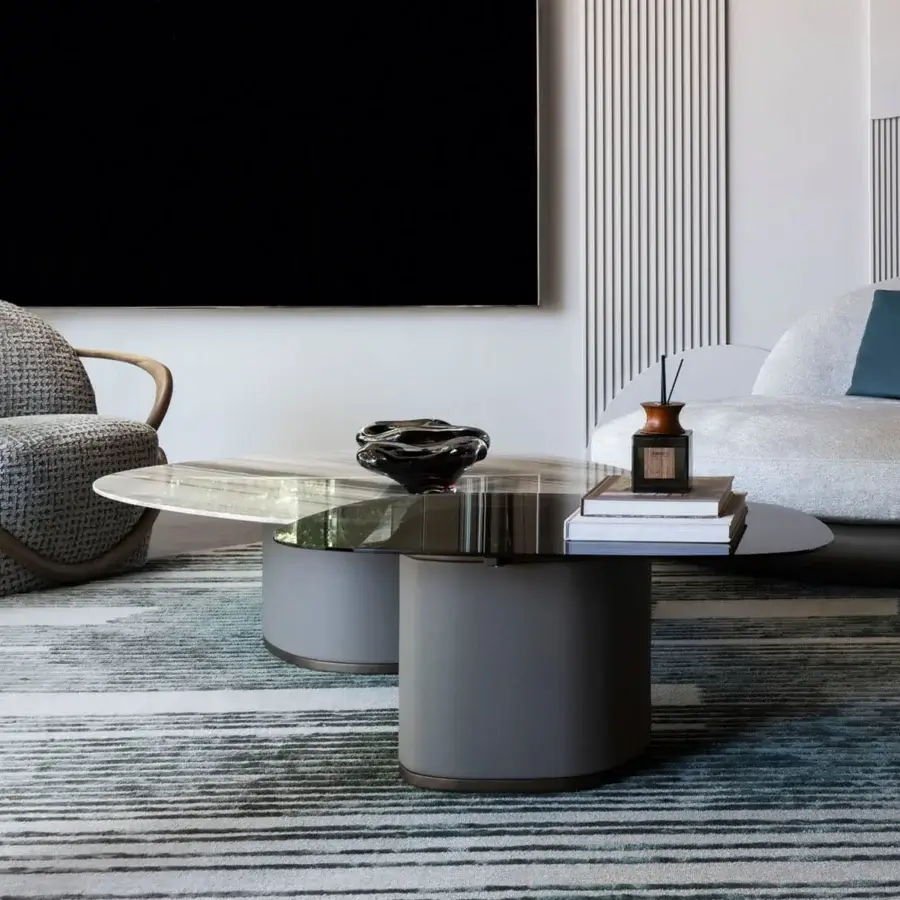 Distinguished Giorgetti Galet coffee table with smoky grey tempered glass tabletop and premium leather wrapped base in bronze metal