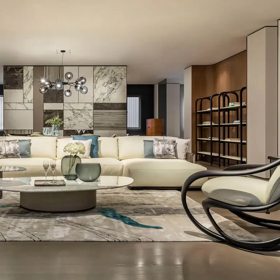 Superior Giorgetti Galet coffee table with luminous marble tabletop and warm bronze-finished leather base