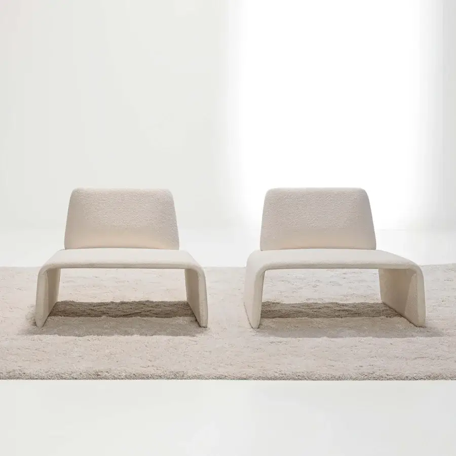 Distinguished LaCividina FourFolds lounge chair in warm neutral beige textured textile with seamless construction