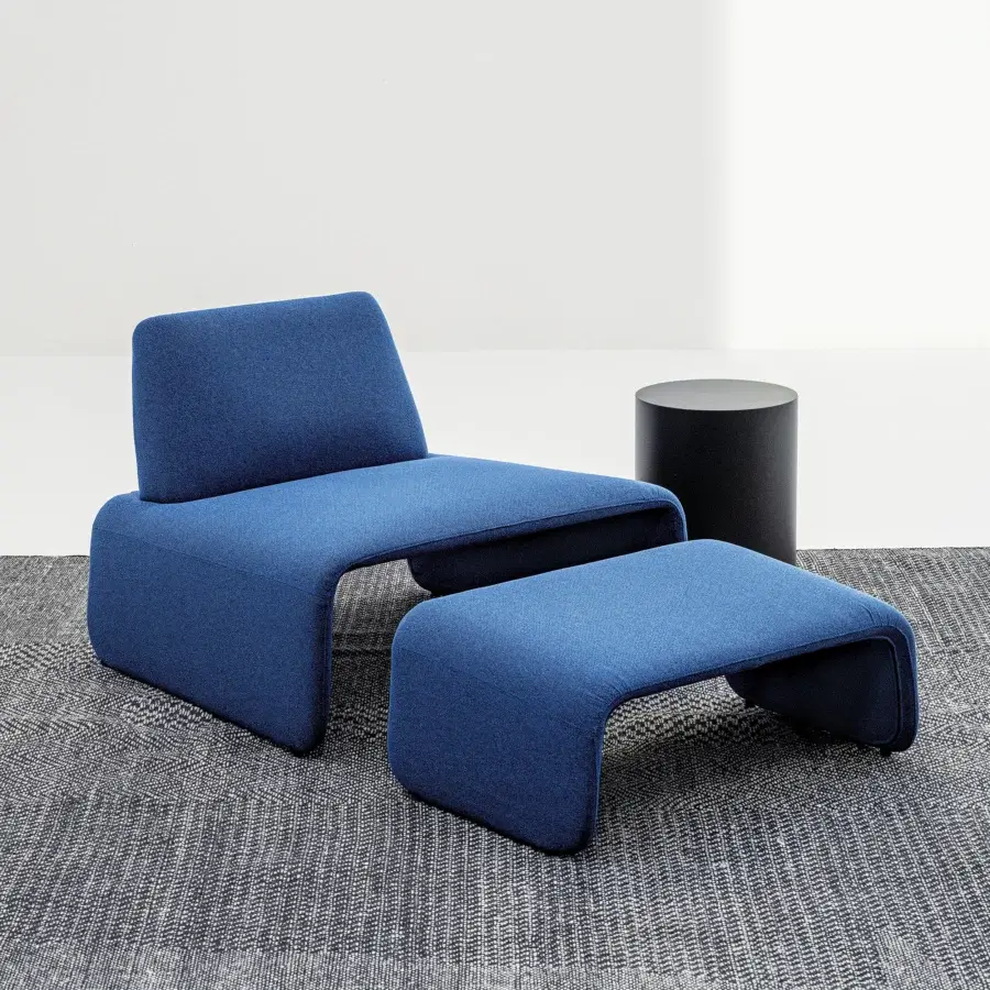 Distinguished LaCividina FourFolds lounge chair in deep blue textured woven fabric with a softly upholstered form
