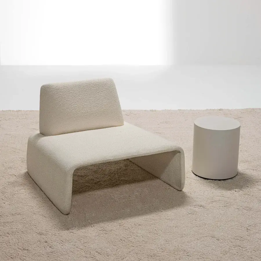 Superior LaCividina FourFolds lounge chair in neutral beige looped-pile textile with seamless monolithic form