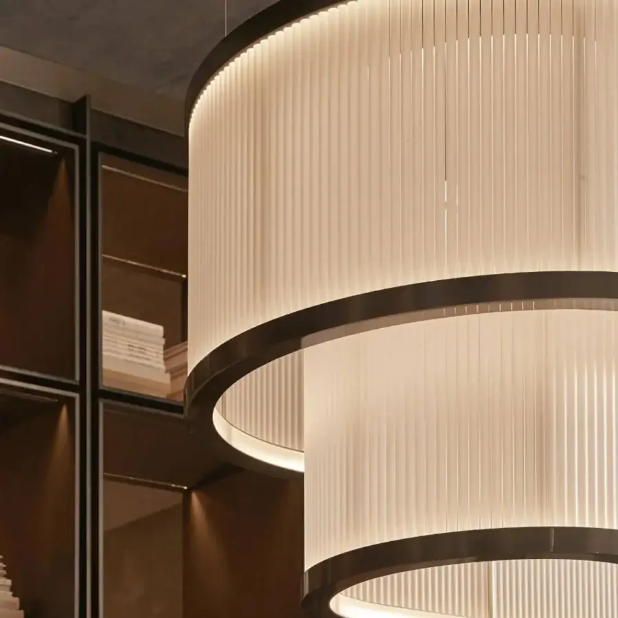 Elegant Visionnaire Giano suspension lamp in vertically ribbed borosilicate glass with a sleek satin steel band