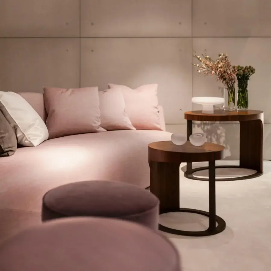 Captivating Giorgetti Ling coffee table crafted in curved Canaletto walnut veneer with a satin finish and bronze-painted metal base