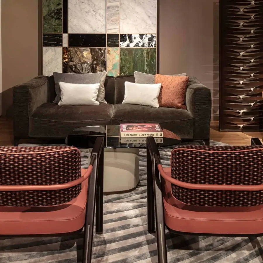 Elegant Giorgetti Ling coffee table with a smooth glass tabletop and sleek matte black metal X-shaped base