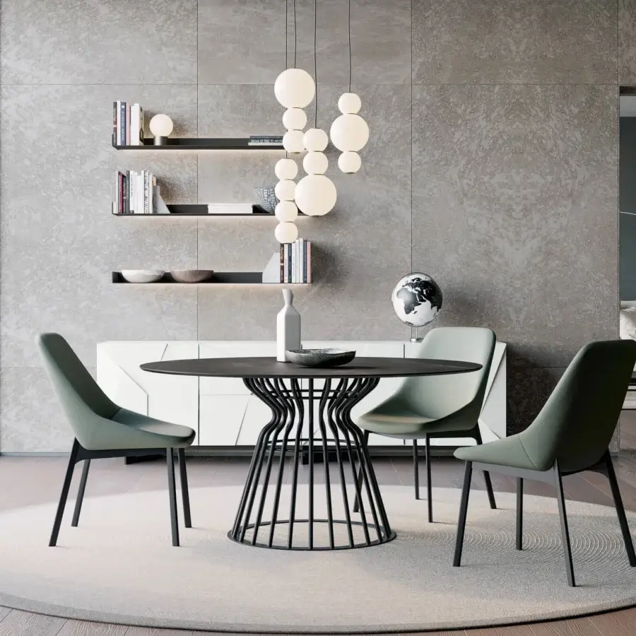 Superior Dallagnese Bomber table with sculptural metal base and smooth, matte dark-toned round tabletop