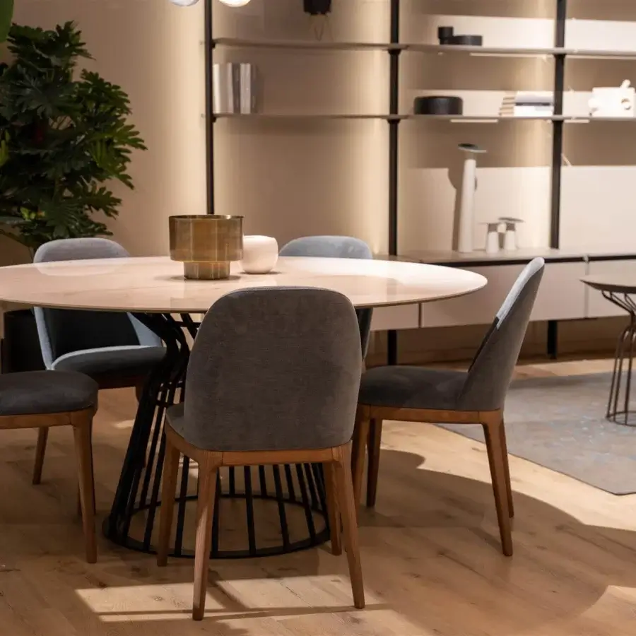 Exceptional Dallagnese Bomber table with warm brown wooden top and sculptural dark metal rods crafted with a satin finish