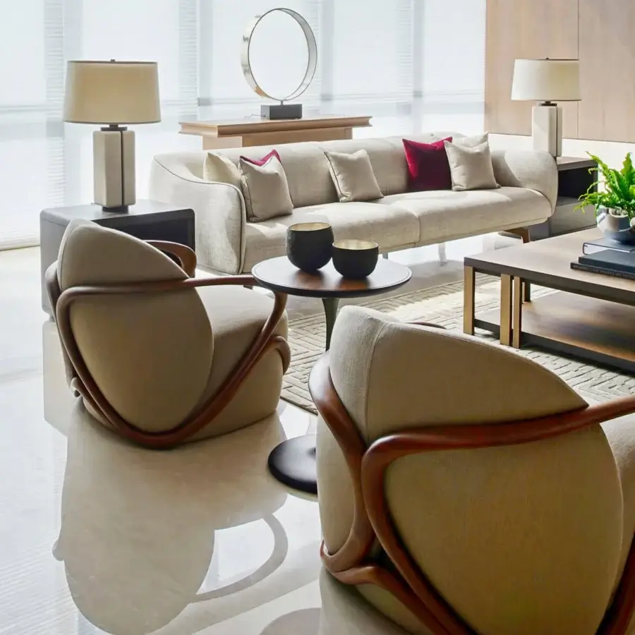 Distinguished Giorgetti Oti side table with polished Pau ferro veneer tabletop and satin-finished bronze column insert and weighted base