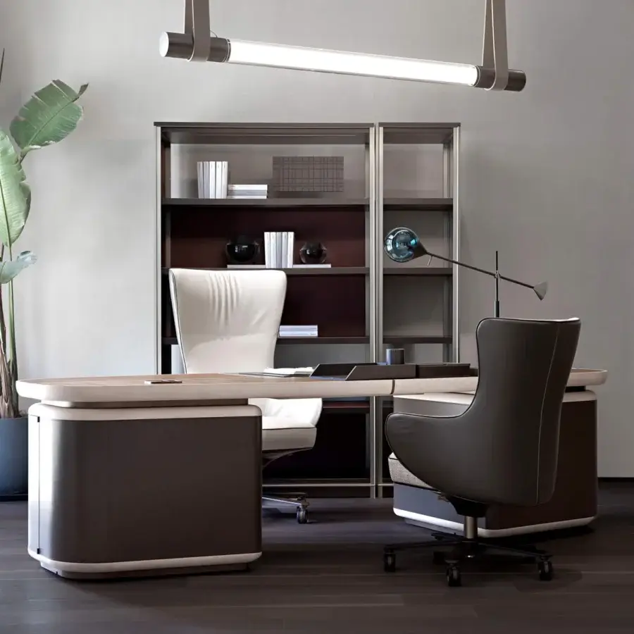 Distinguished Giorgetti Genius armchair with a profiled steel backrest and muted gray-brown textile upholstery, finished with a natural-effect bronze base