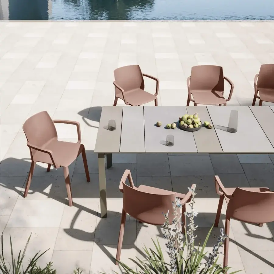 Superior MY YOUR Ada chair with a muted terracotta tone and durable synthetic material built with a matte finish