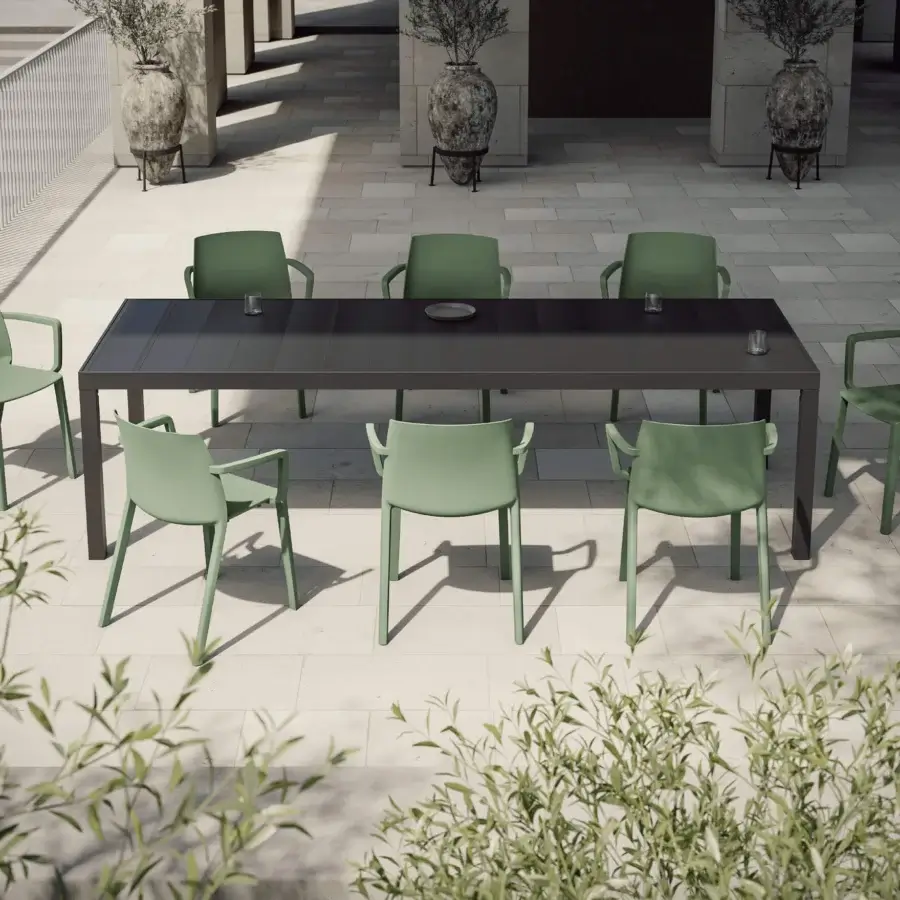 Elegant MY YOUR Ada chair with integrated armrests and an ergonomic backrest in matte sage green synthetic material