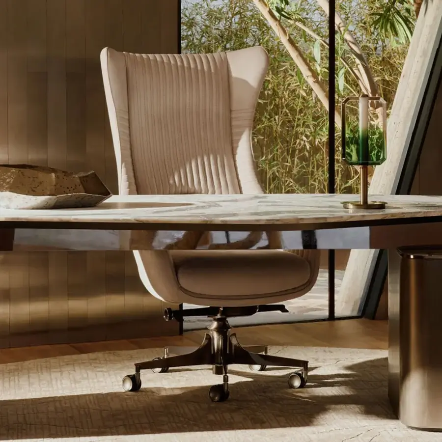 Distinguished Visionnaire Planet Office chair with neutral beige quilted leather upholstery and satin sheen stainless steel base