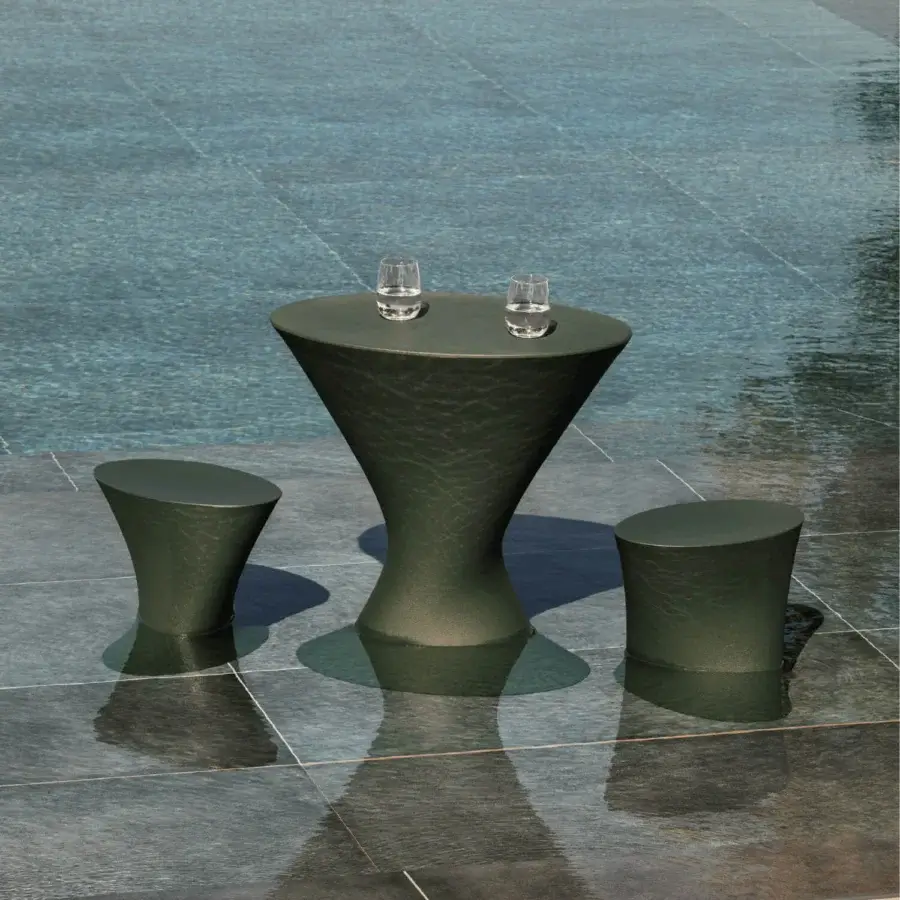 Distinctive MY YOUR Iris stool in dark green recyclable Poleasy with a subtly textured, hourglass silhouette