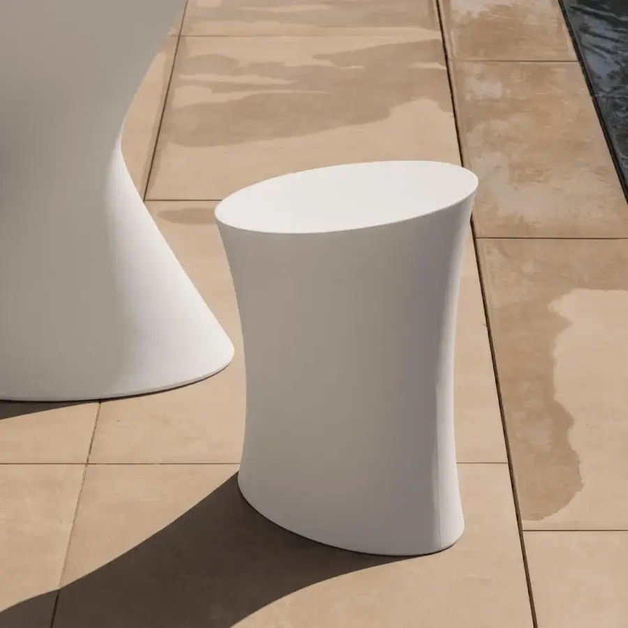 Distinguished MY YOUR Iris stool with sleek curved silhouette crafted in bright white recyclable Poleasy with matte finish