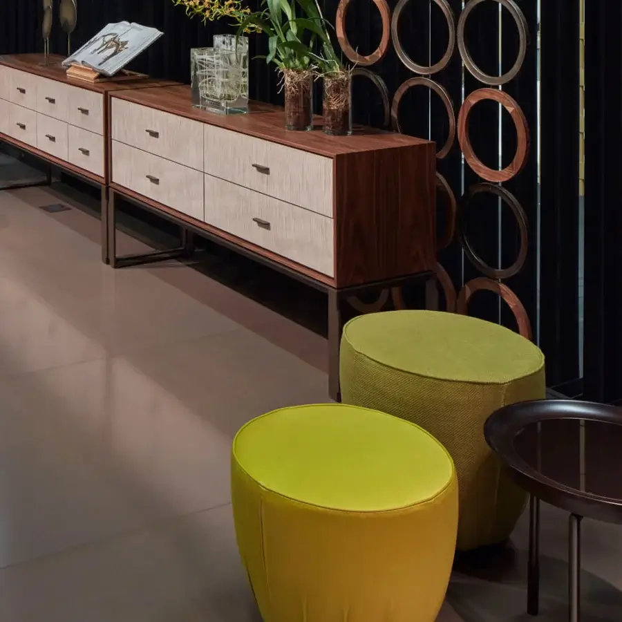 Distinguished Giorgetti Topaze ottoman built with wood and polyurethane cushioning in chartreuse green textile with polished beech feet