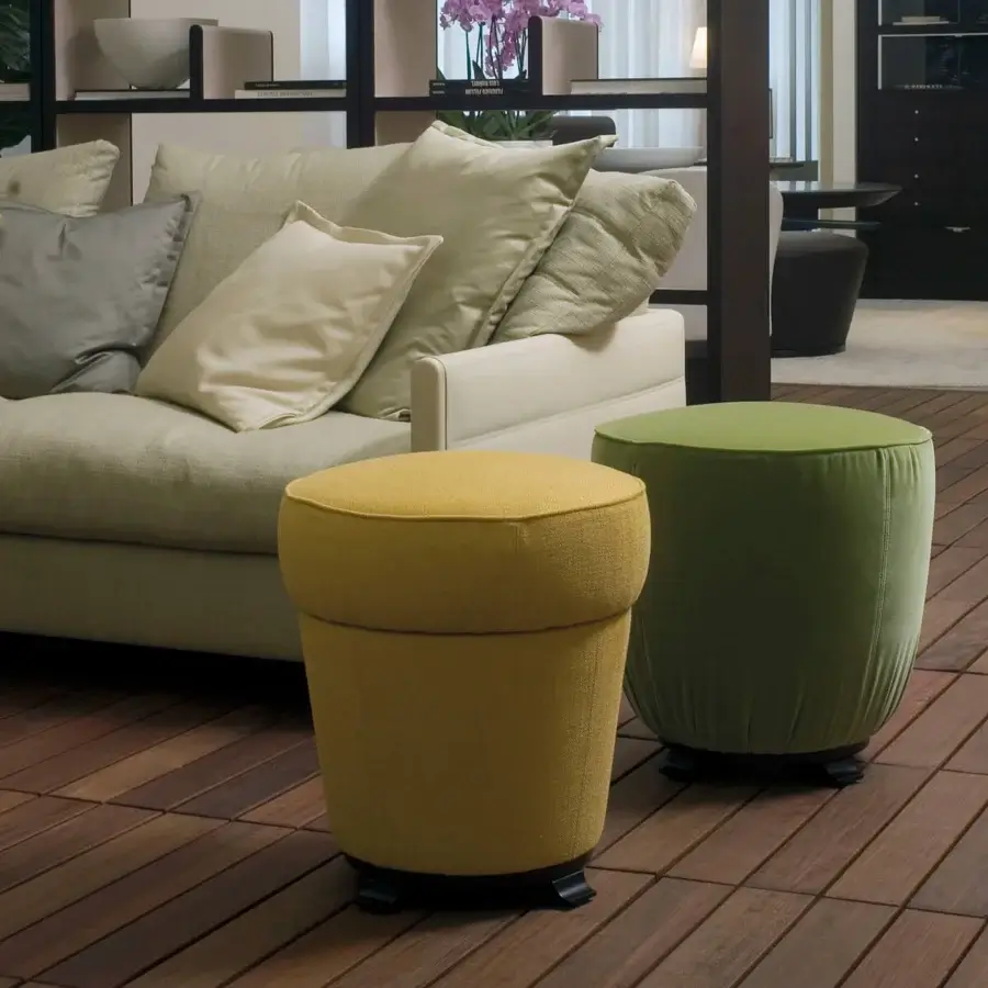 Exceptional Giorgetti Topaze ottoman crafted with wood and multi-density polyurethane cushioning upholstered in golden-yellow textile with polished beech legs