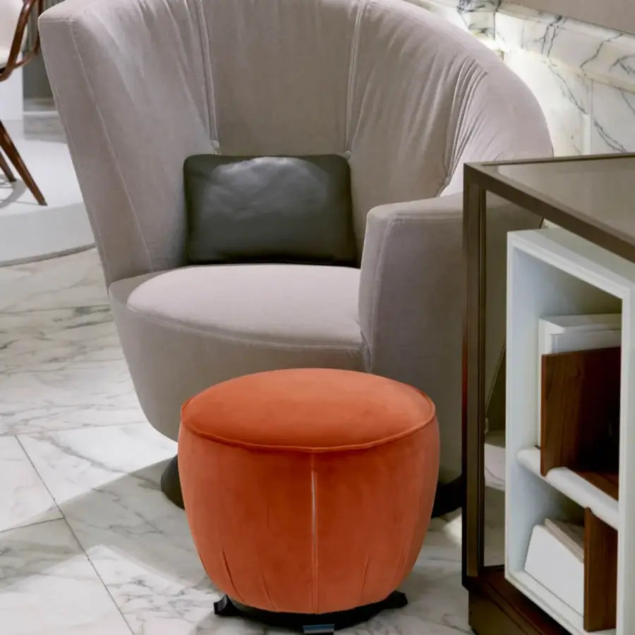 Lavish Giorgetti Topaze ottoman crafted with reddish-orange textile upholstery and polished beech feet