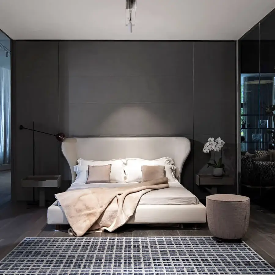 Superior Giorgetti Topaze ottoman crafted with warm gray textile upholstery and polished beech base