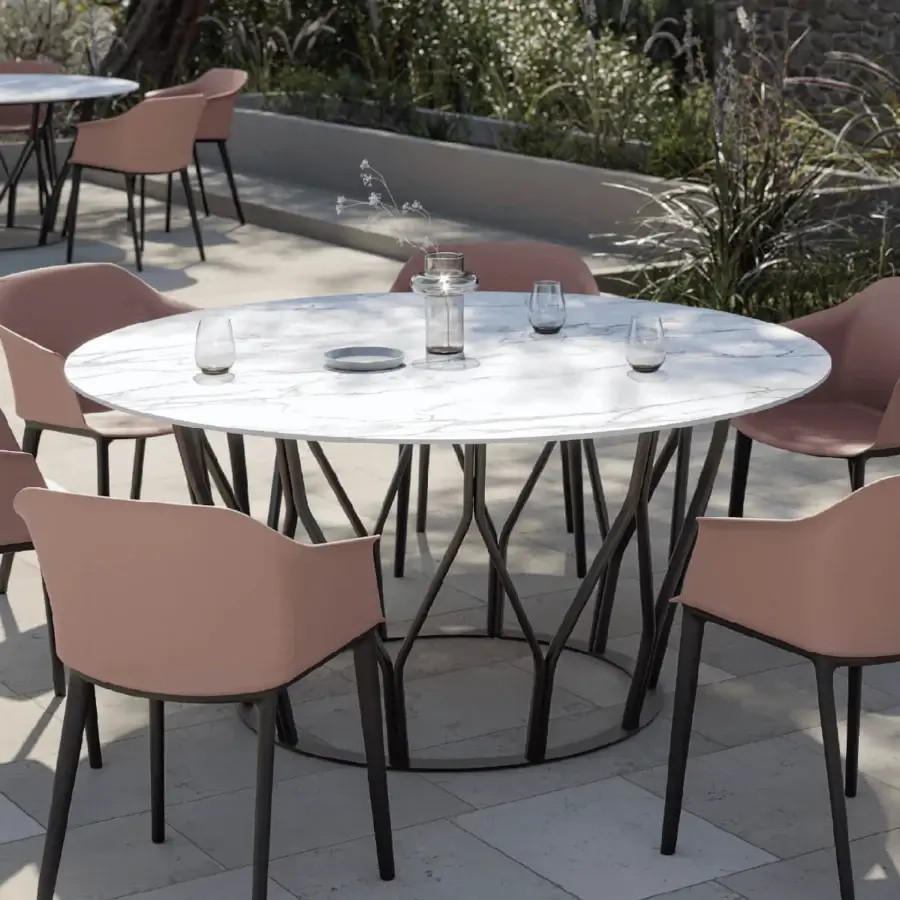 Captivating MY YOUR Mimí round table with polished white stoneware and matte black recyclable aluminum base