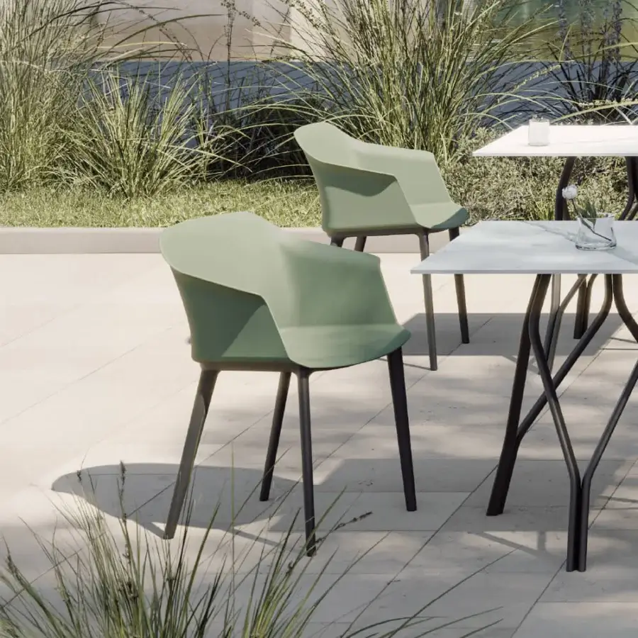 Superior MY YOUR Sofia armchair crafted in sage green polypropylene with sleek dark gray metal legs