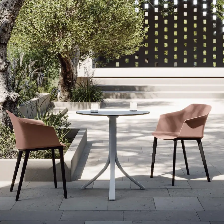 Elegant MY YOUR Sofia armchair in terracotta polypropylene with a matte finish and integrated black legs