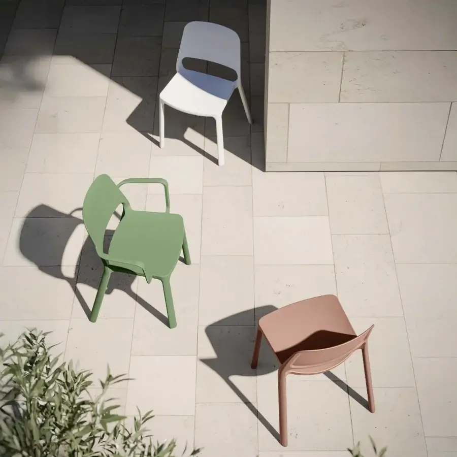 Elegant MY YOUR Tina chair crafted from durable polypropylene in a dusty rose hue with smooth matte finish