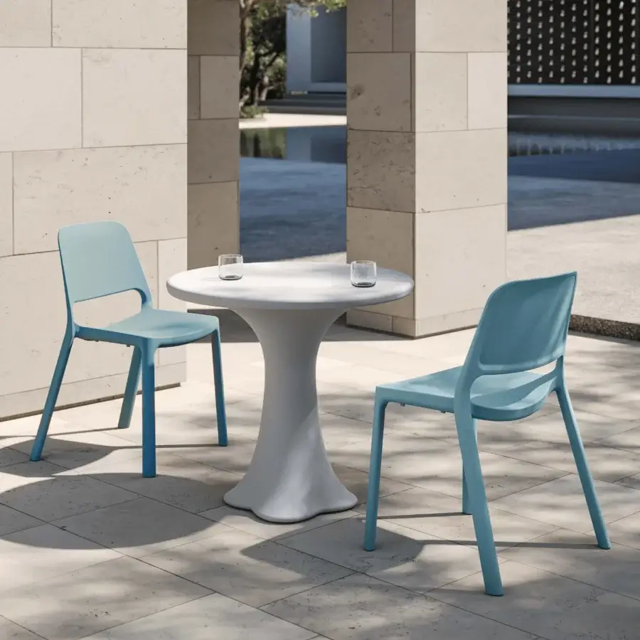 Superior MY YOUR Tina chair crafted from durable polypropylene with a subtly textured matte finish in muted blue-green tones