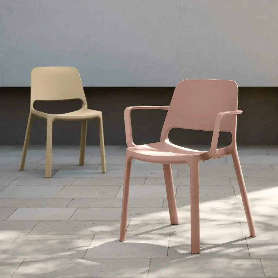 Elegant MY YOUR Tina chair molded from durable polypropylene in a muted rose tone with a sophisticated matte finish