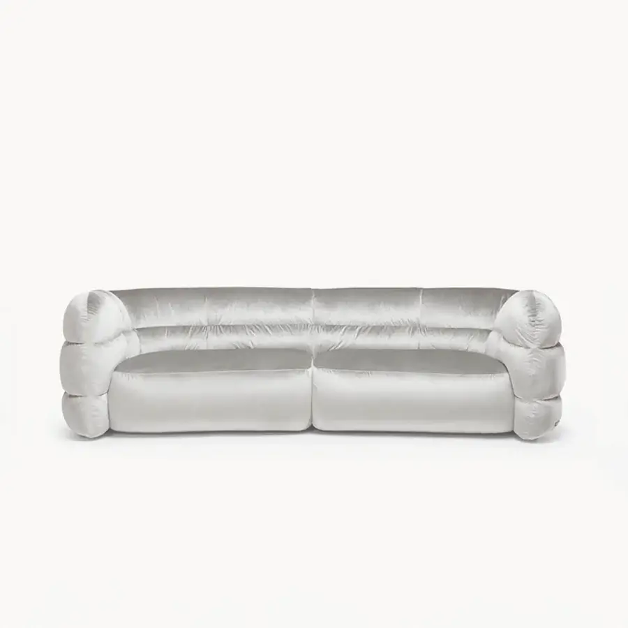 Superior Visionnaire Bomber sofa built with silvery gray textile and satin finish offering enveloping comfort with innovative fiber padding