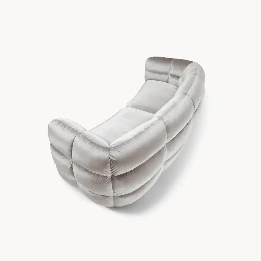 Lavish Visionnaire Bomber sofa upholstered in light gray textile with satin finish and quilted surface