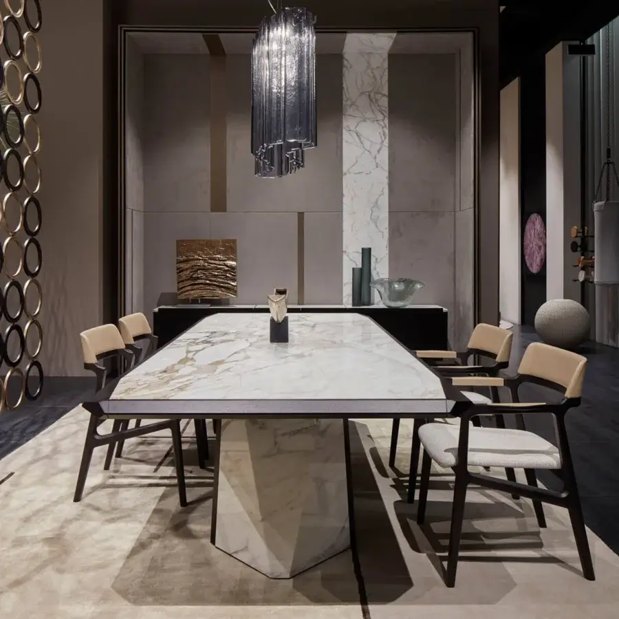 Luxury Giorgetti Amadeus table built with Canaletto walnut and marble, showcasing polished edges with a captivating geometric base